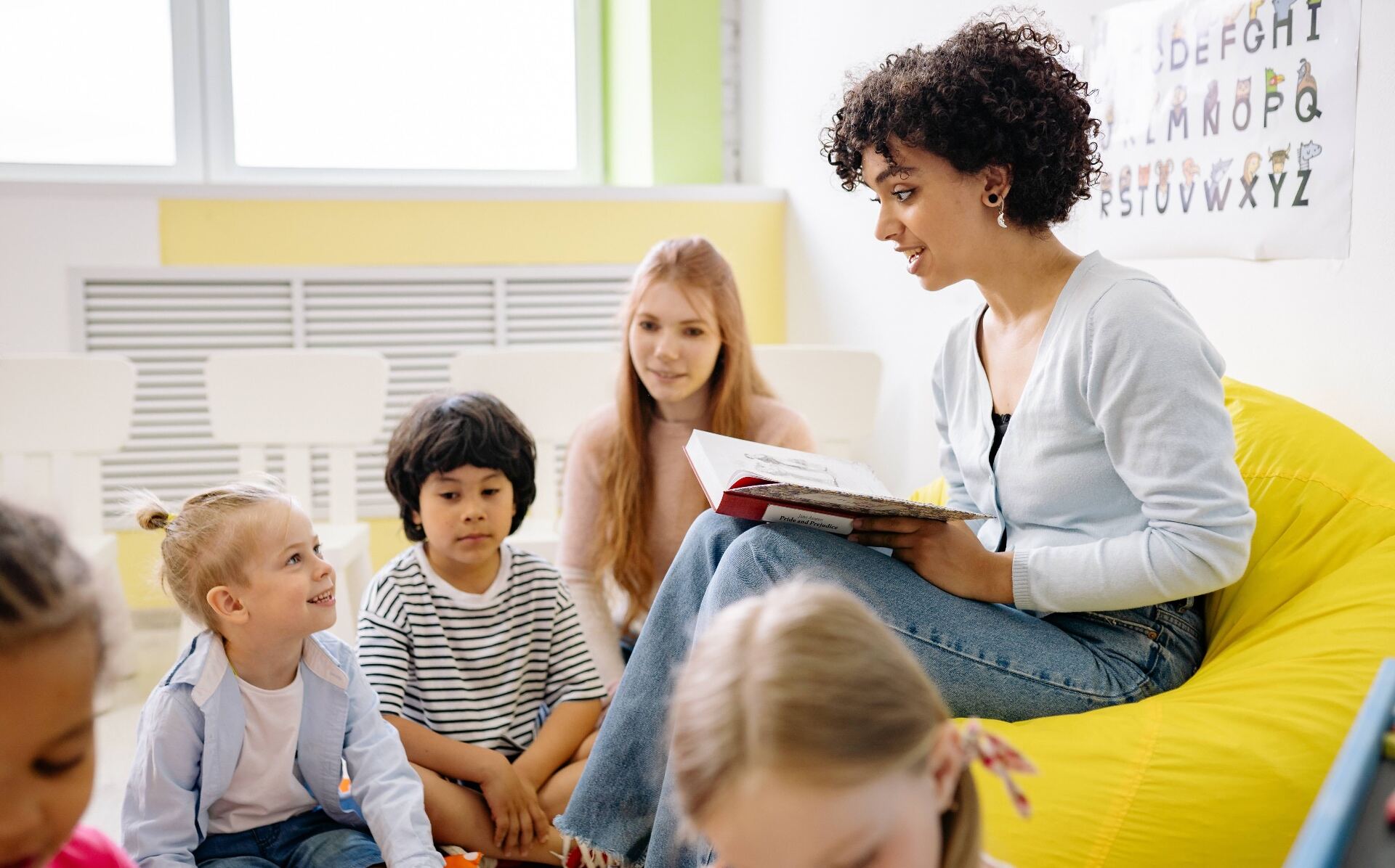 Children learning together with a teacher